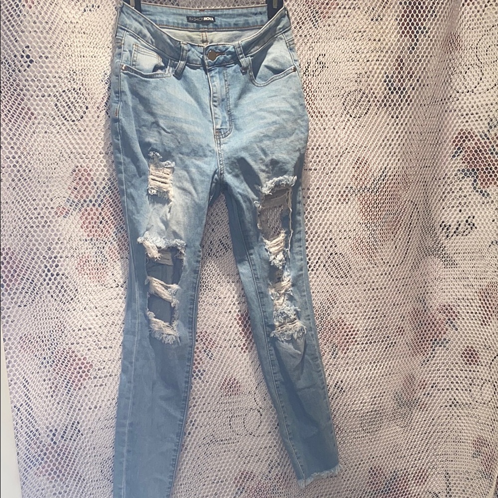 Distressed Light Blue Jeans